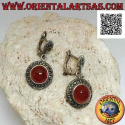 Silver earrings with round...