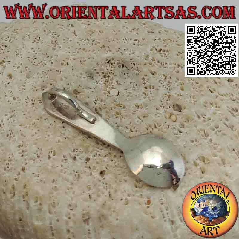 Silver pendant in the shape of a spoon with engraved astral symbols