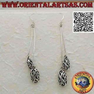 Silver earrings with a pair of sticks and hanging openwork ellipsoids