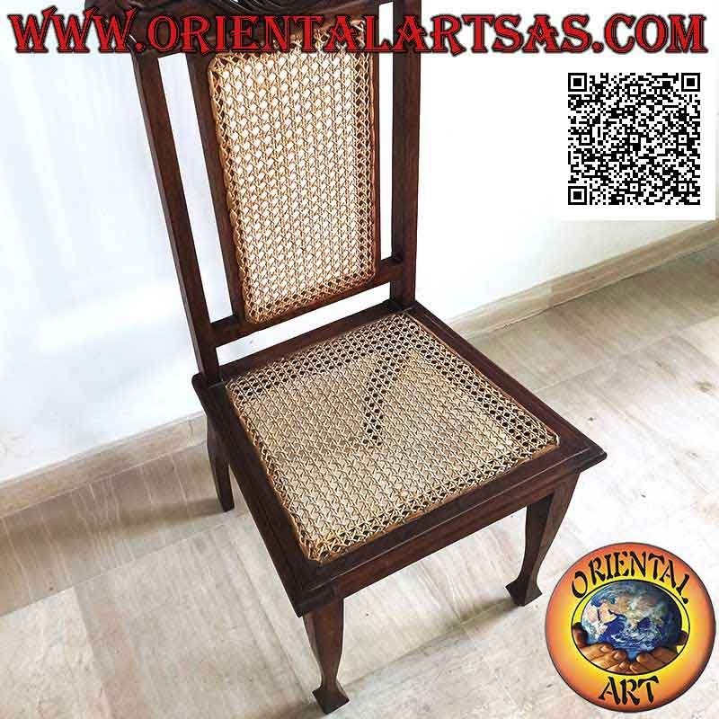 Colonial style chair with lotus flower, in teak wood and Vienna straw seat and back