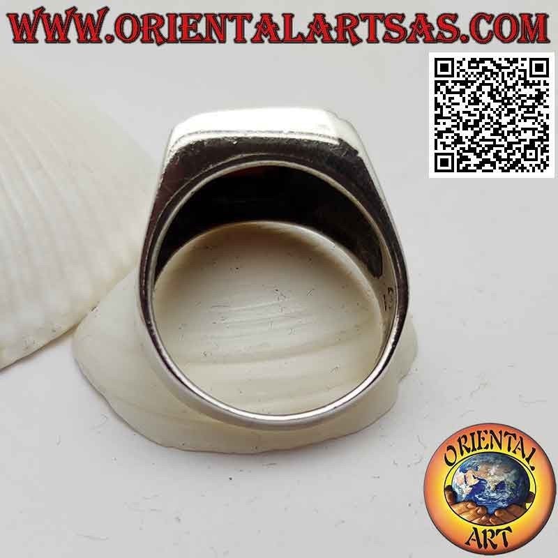 Silver ring with rectangular flush carnelian and scorpion engraved on the sides