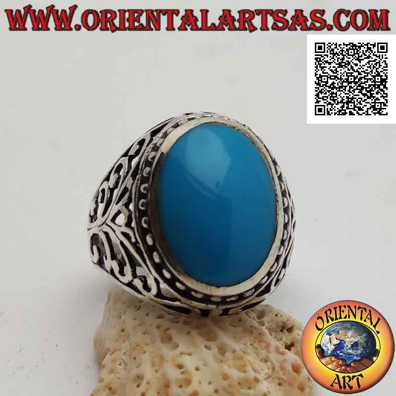 Bague en argent avec cabochon ovale turquoise entouré de points et décor baroque perforé sur les côtés