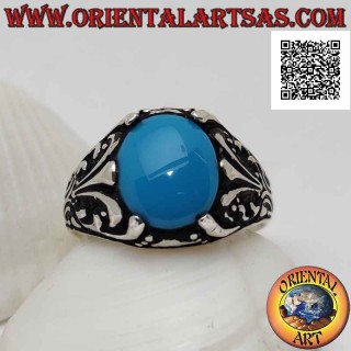 Anello in argento con turchese ovale cabochon incastonato da decorazione floreale con giglio sui lati