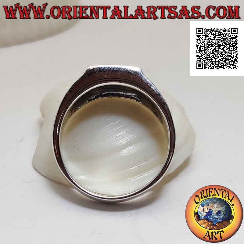 Silver ring with square carnelian flush with the edge and bas-relief triquetra on the sides