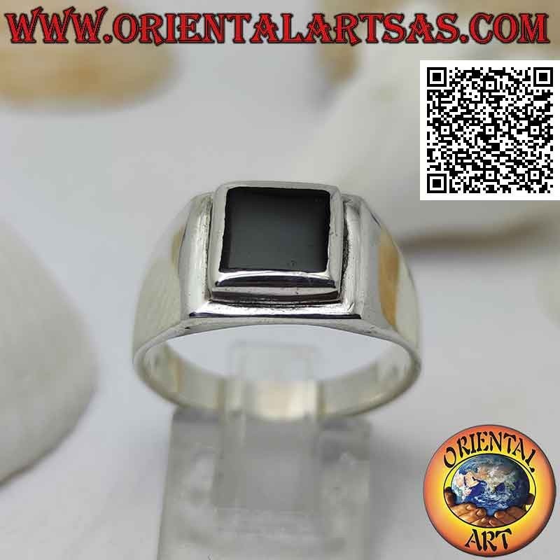 Smooth silver ring with square onyx set flush with the edge on a raised square