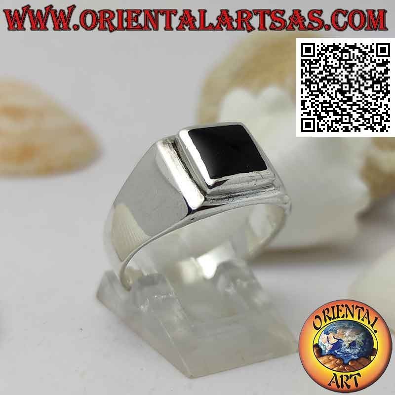 Smooth silver ring with square onyx set flush with the edge on a raised square