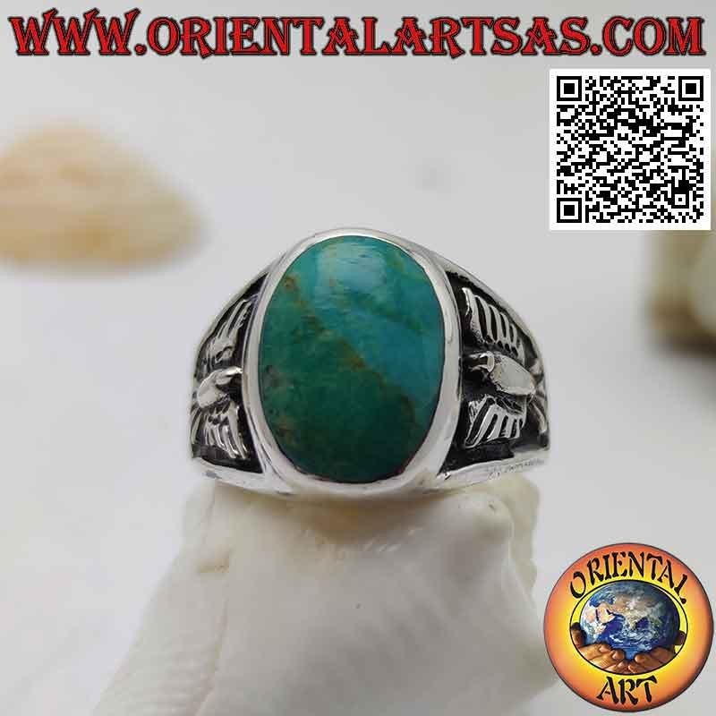 Anello in argento con turchese naturale ovale ed aquila a bassorilievo sui lati (24)
