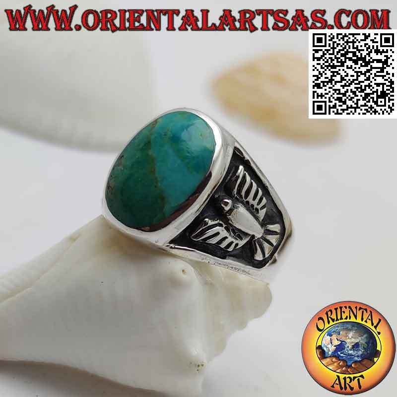 Silver ring with natural oval turquoise and bas-relief eagle on the sides (24)