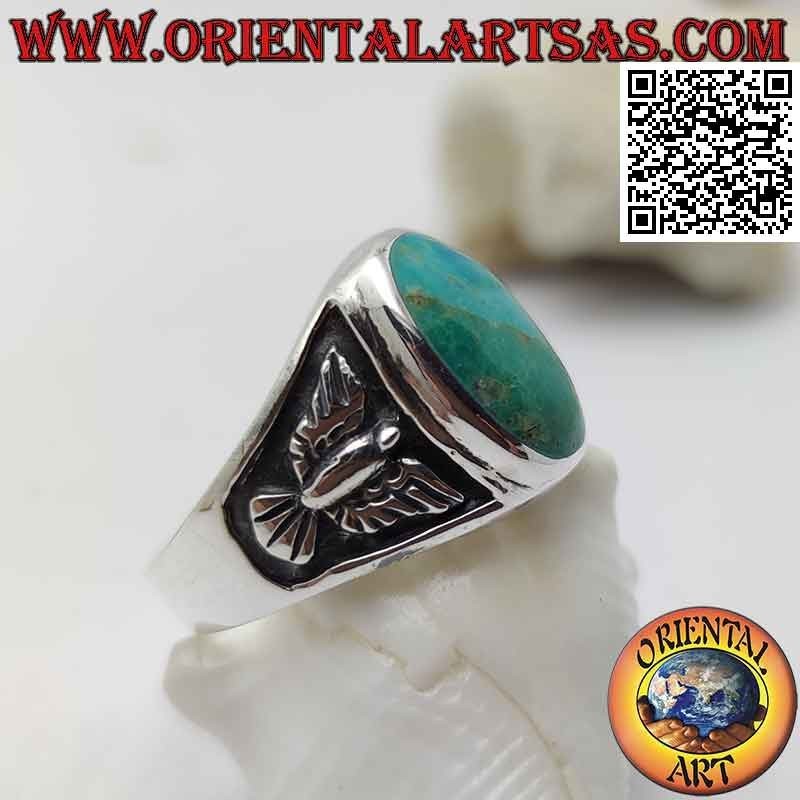 Anello in argento con turchese naturale ovale ed aquila a bassorilievo sui lati (24)