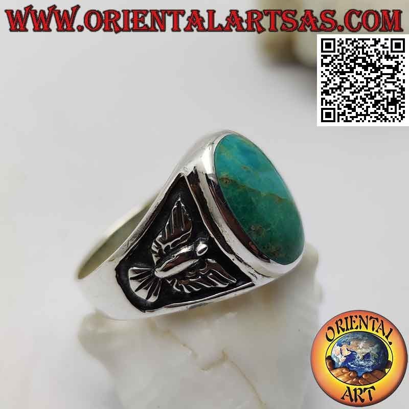 Anello in argento con turchese naturale ovale ed aquila a bassorilievo sui lati (24)