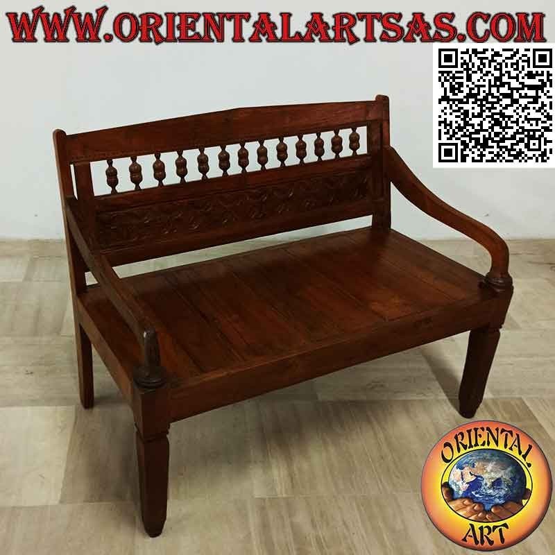 Banco antiguo con flores talladas a mano en madera de teca