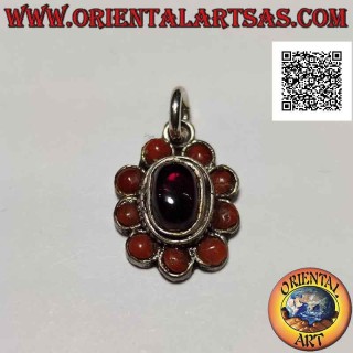 Silver flower pendant with central cabochon oval garnet surrounded by corals