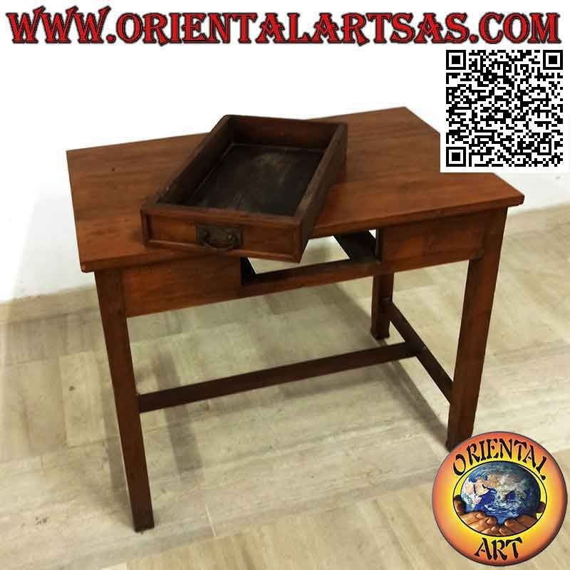 Antique desk with central drawer and footrest in teak wood