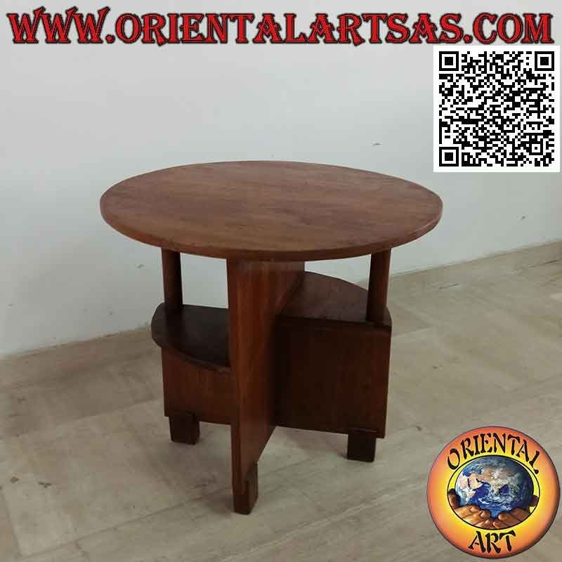 Round coffee table with asymmetrical shelves in antique teak wood