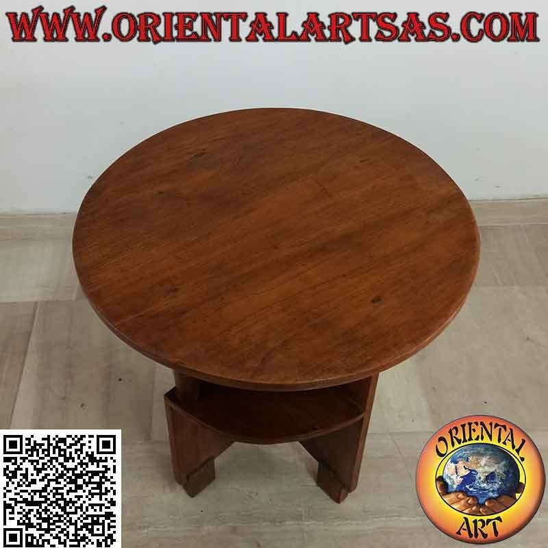 Round coffee table with asymmetrical shelves in antique teak wood