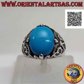 Silver ring with oval cabochon turquoise set at 4 with lily decoration on the sides
