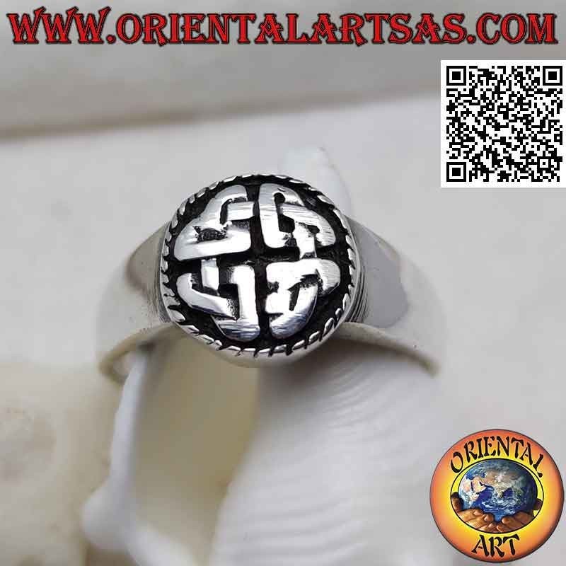 Smooth round silver ring with Duleek knot in bas relief (Celtic symbol)