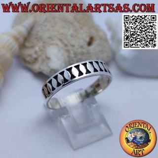 Silver ring with smooth vertical ovals in bas-relief
