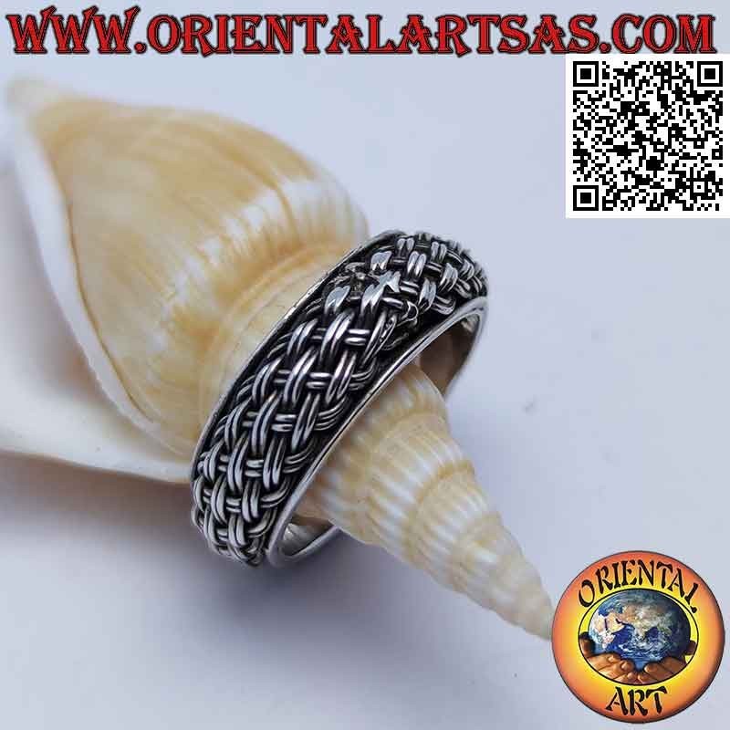 Silver ring with rounded band, intertwining of a couple of lines