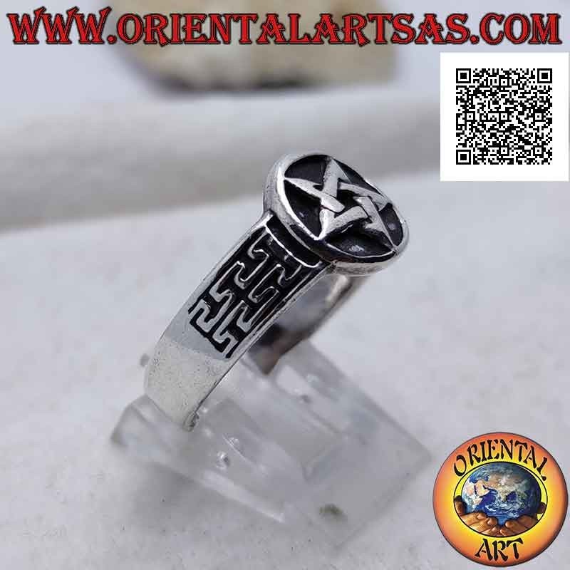 Silver ring with smooth pentacle in the circle in bas-relief and side engraved decoration