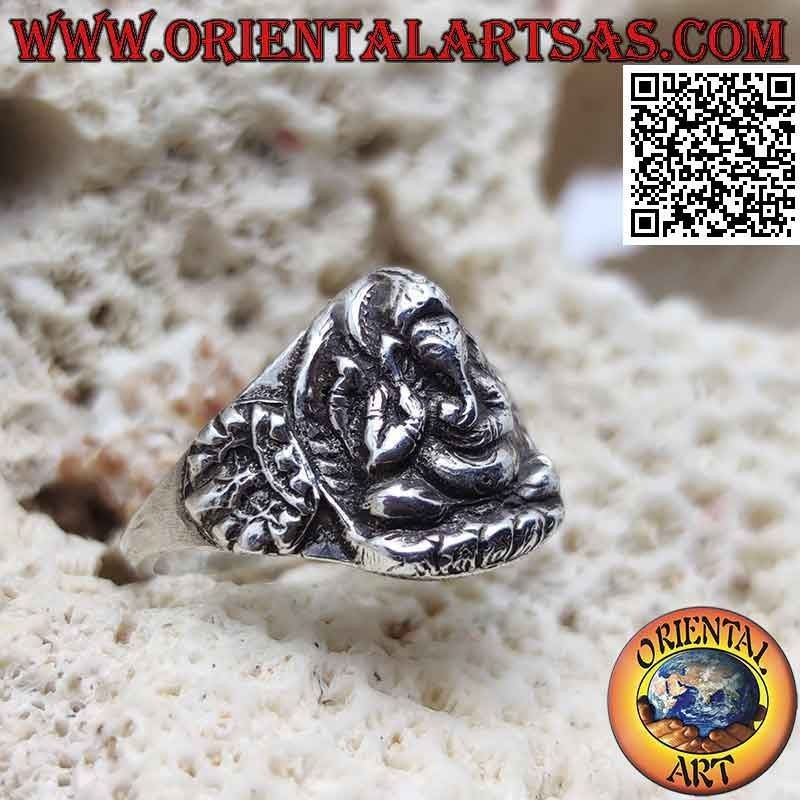 Silver ring with seated Ganesh in high relief and crown on the sides