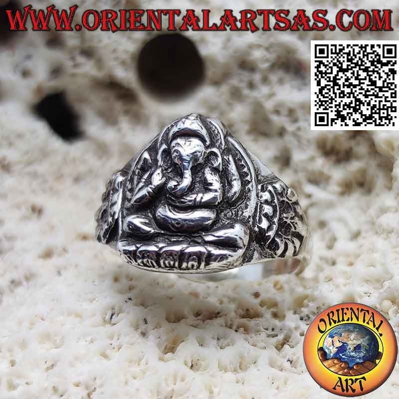 Silver ring with seated Ganesh in high relief and crown on the sides