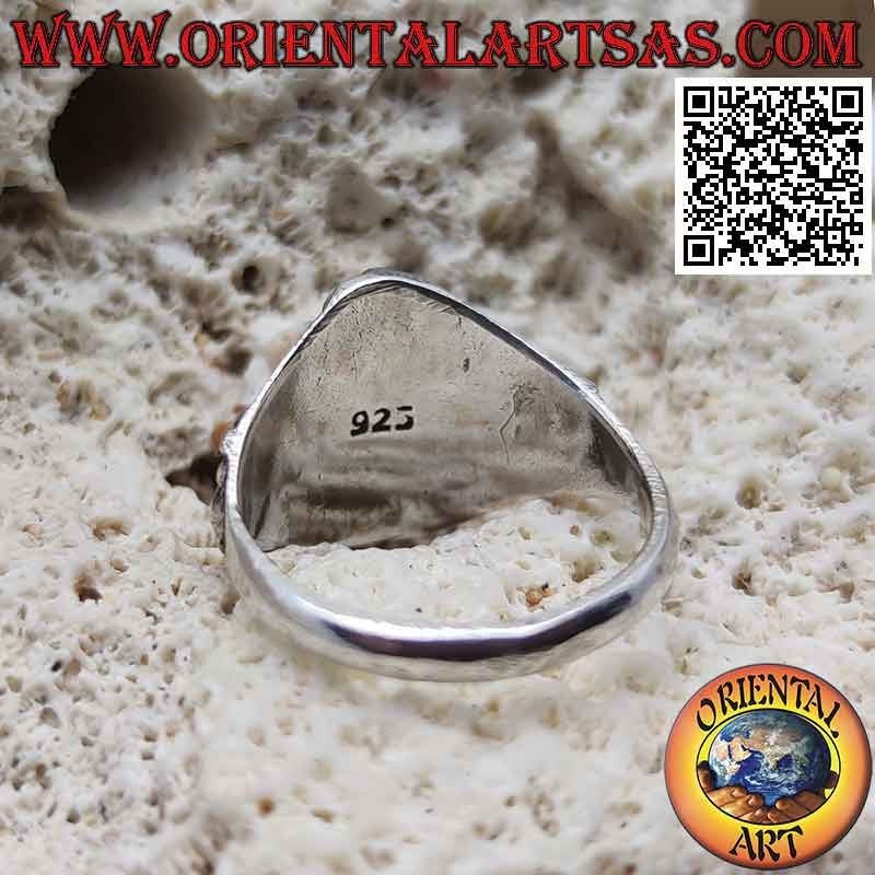 Bague en argent avec Ganesh assis en haut relief et couronne sur les côtés