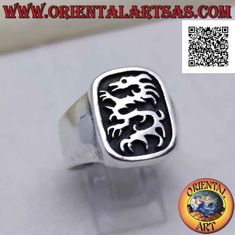 Smooth silver ring with lindworm (dragon) in the curved rectangle in bas-relief