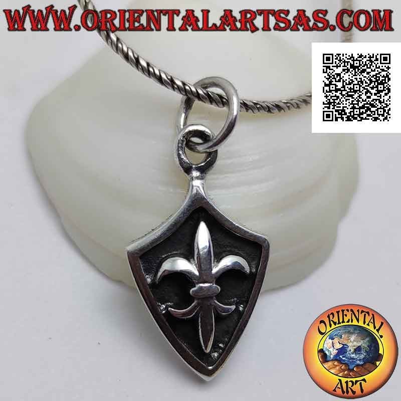 Silver pendant, rhomboid shield with lily in high relief on a darkened background
