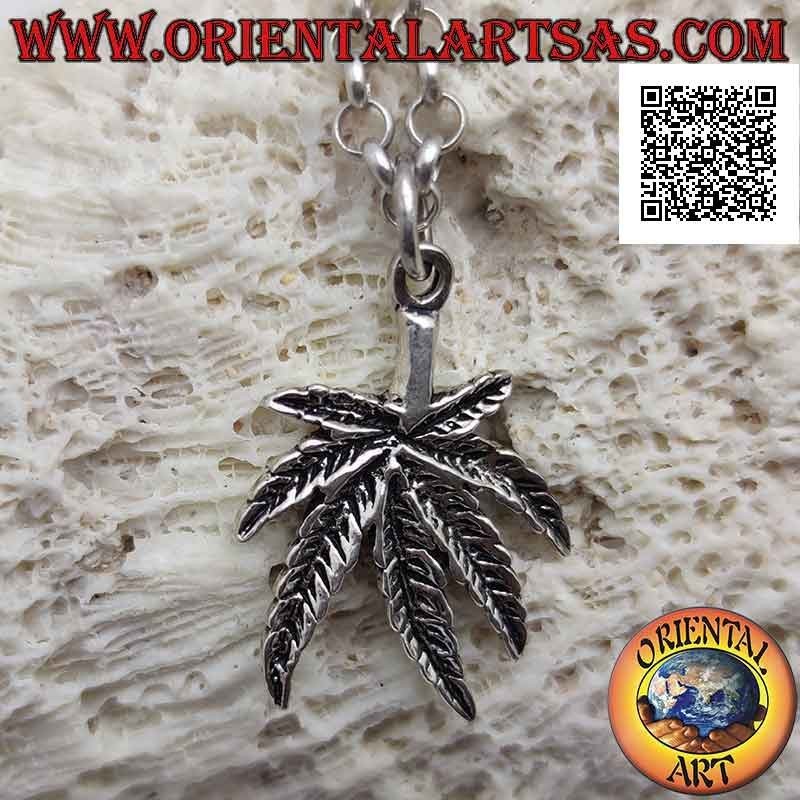 Silver pendant in the shape of a marijuana leaf engraved in low relief (thick)