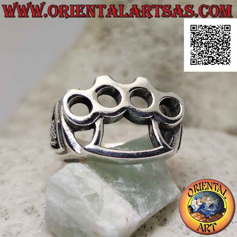 Silver ring with perforated brass knuckles (cazzottiera) and pirate skull in bas-relief on the sides
