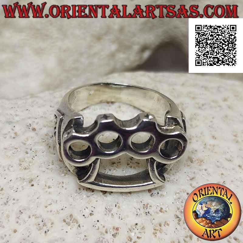 Silver ring with perforated brass knuckles (cazzottiera) and pirate skull in bas-relief on the sides