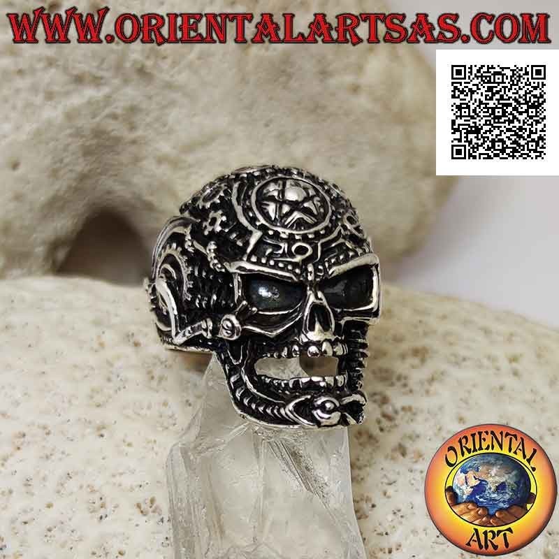 Silver ring in the shape of a satanic skull worked with gears and pentacle engraved on the forehead