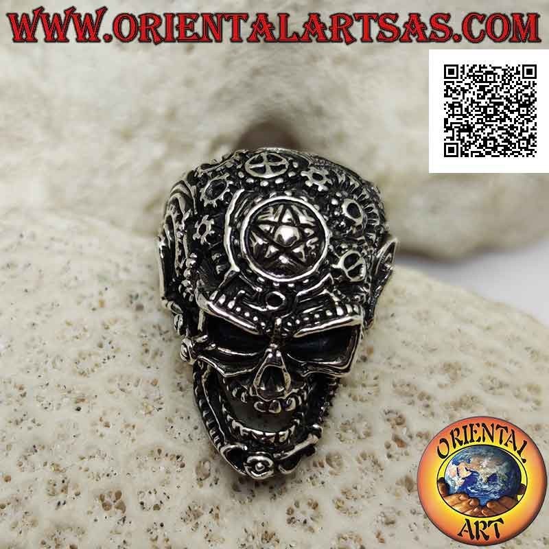 Silver ring in the shape of a satanic skull worked with gears and pentacle engraved on the forehead