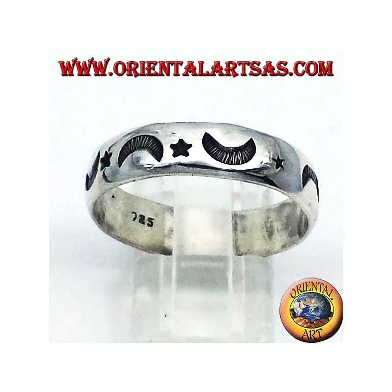 silver ring, carved star and moon