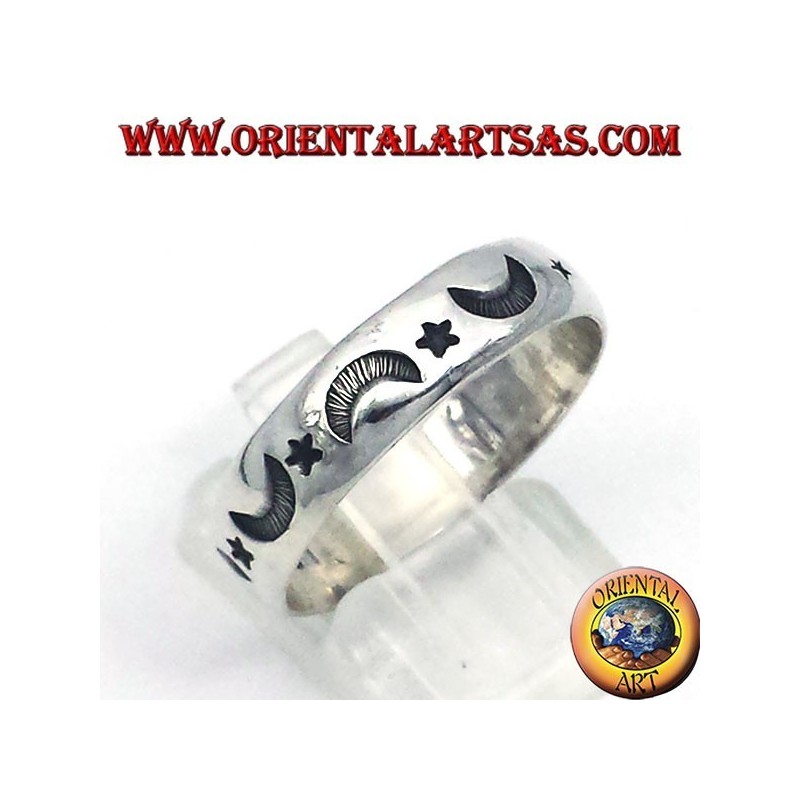 silver ring, carved star and moon
