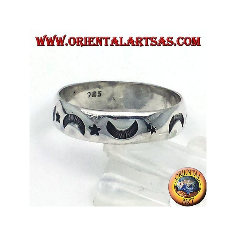 silver ring, carved star and moon