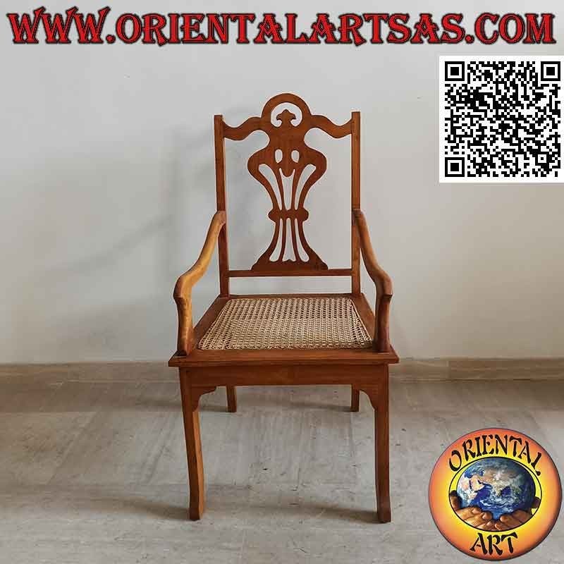 Sillón de estilo "victoriano" en madera de teca y asiento de paja de Viena