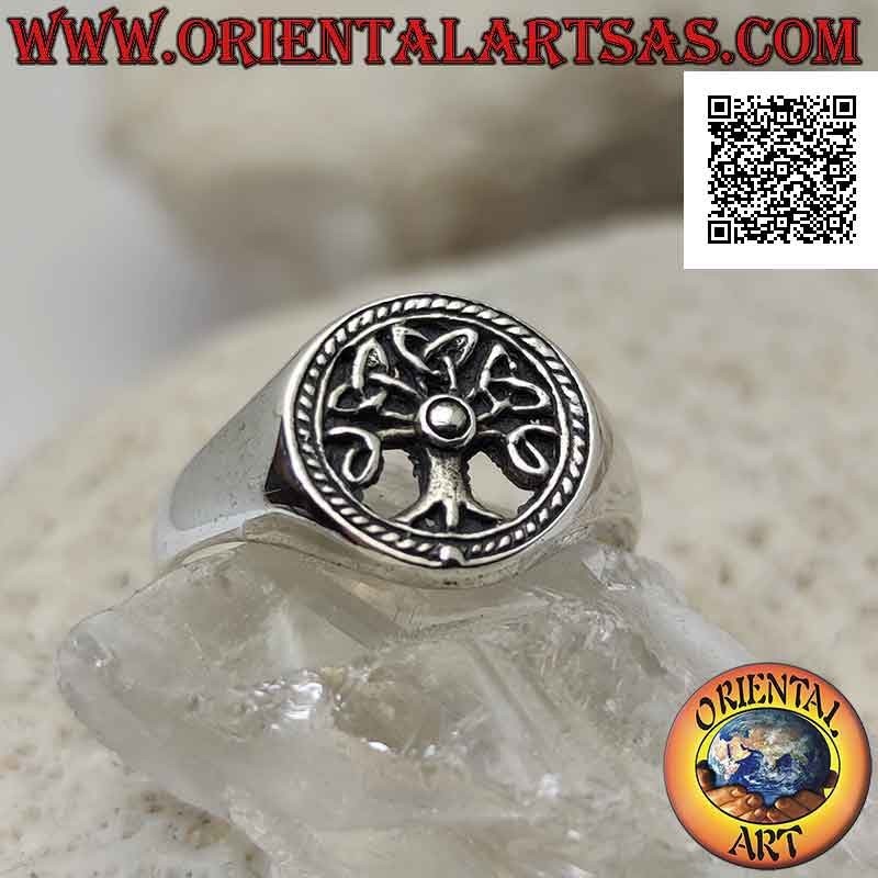 Silver ring with tree of life in the openwork circle and dotted decoration
