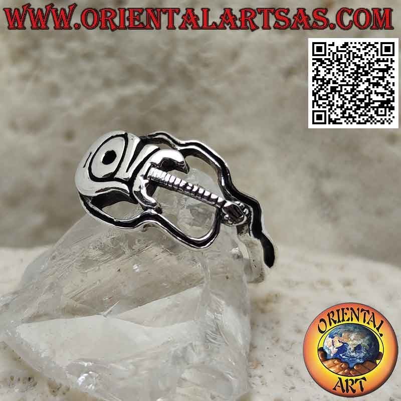 Silver ring in the shape of an electric guitar with "Love" writing