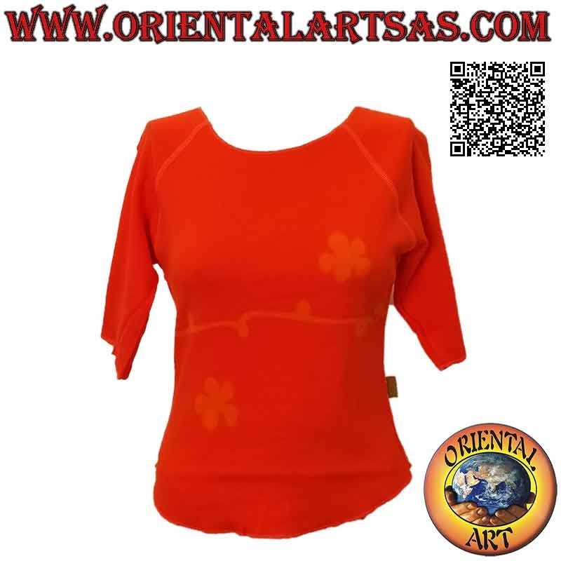 Free size sweater with raw cut collar, short sleeves and pattern (orange)