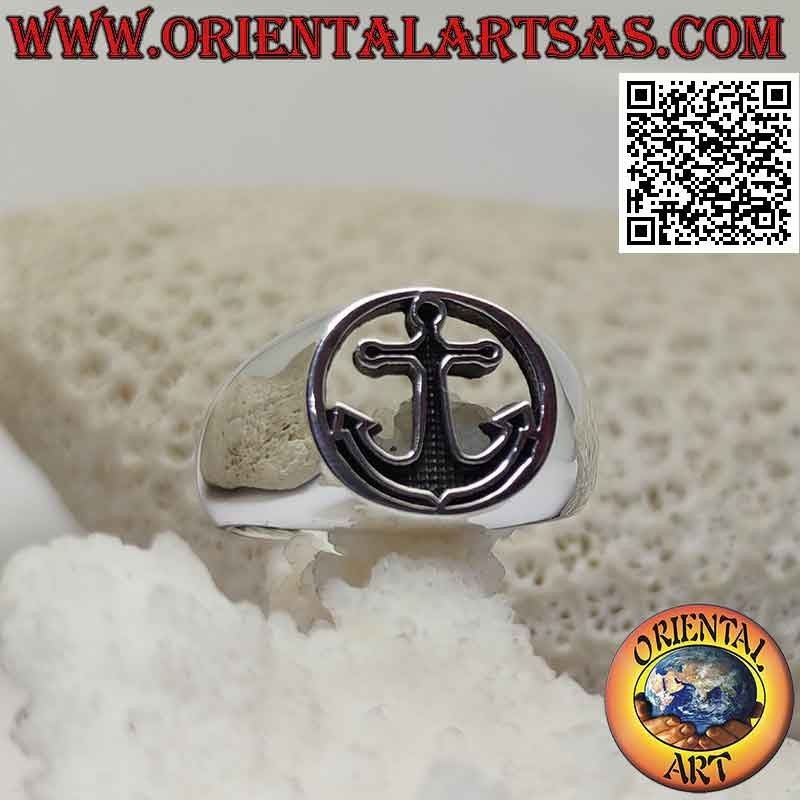Smooth silver ring with bas-relief anchor in the pierced circle