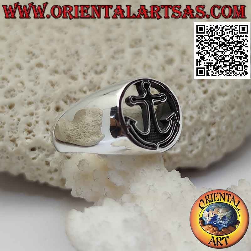Smooth silver ring with bas-relief anchor in the pierced circle