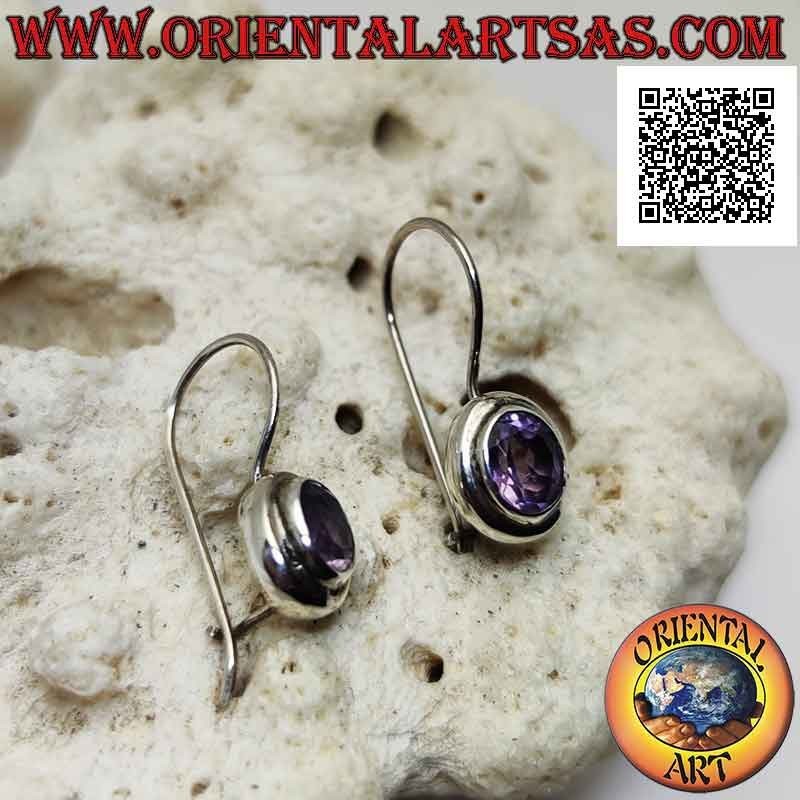 Silver leverback earrings with faceted oval amethyst surrounded by a double smooth edge