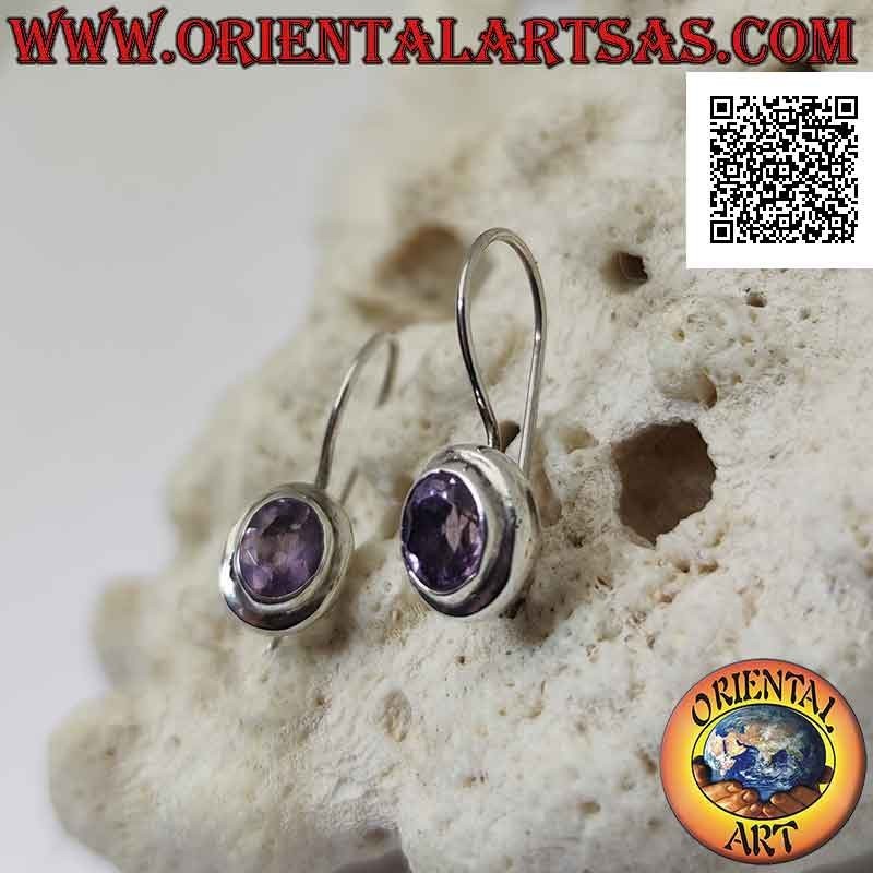 Silver leverback earrings with faceted oval amethyst surrounded by a double smooth edge
