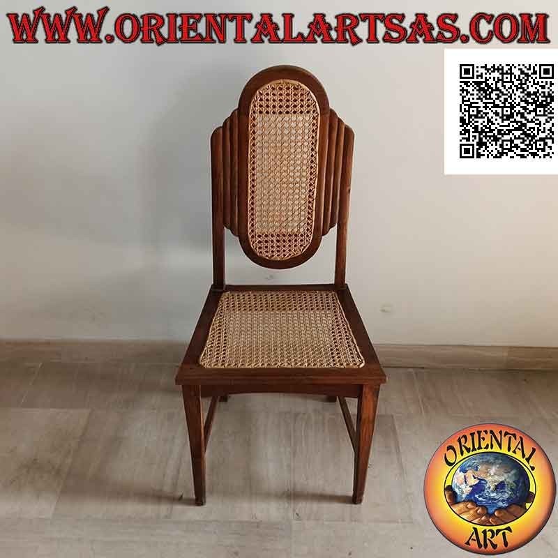 Silla de estilo colonial con respaldo ovalado en madera de teca y paja de Viena