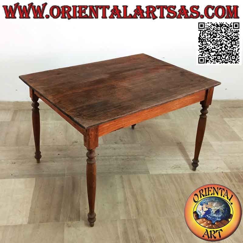 Rectangular antique table in ethnic style with top of two unique teak wood tables