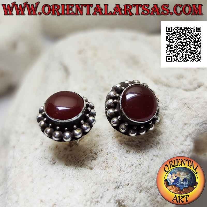 Silver lobe earrings with round cabochon carnelian surrounded by silver spheres