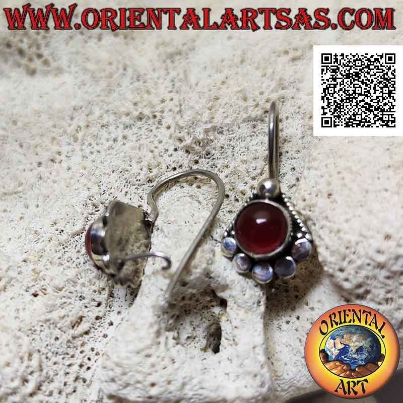 Silver earrings with round cabochon carnelian surrounded by studs below and ball above