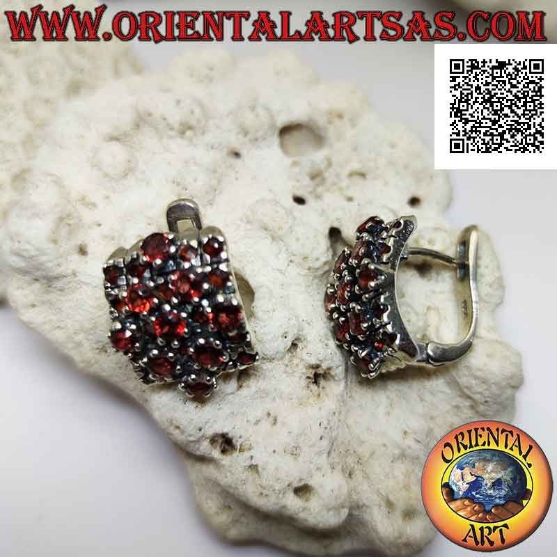Silver earrings, curved rectangle and rhombus overlaid with small and large round garnets